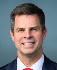Official portrait of John McGuire